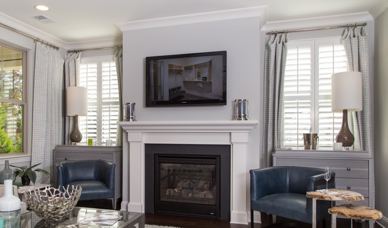 Chicago fireplace with white shutters.